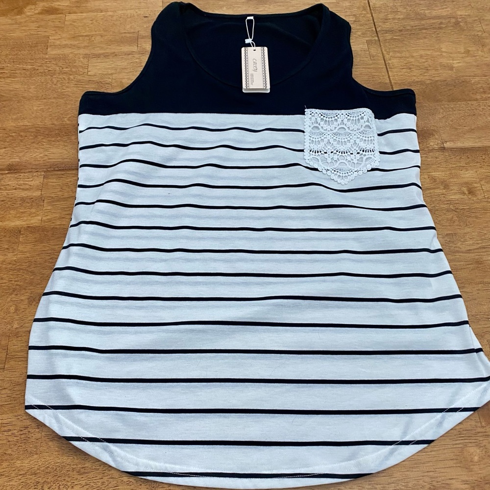 CHIVITY women’s tank top with lace detailed pocket.